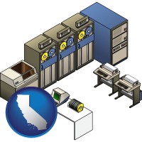 california map icon and a 20th century mainframe computer used for data processing