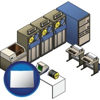 co map icon and a 20th century mainframe computer used for data processing